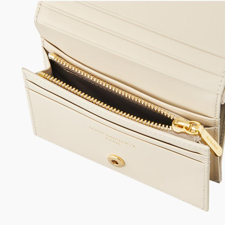 L-quilting en cuir bifold demi-portefeuille